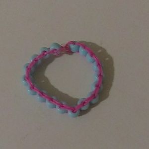 Pink and blue rubber band bead bracelet